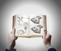 seed funding, book with idea and money