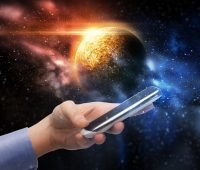 how to name an app - person with phone in hand in front of globe.