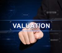 image of finger pointing at startup valuation