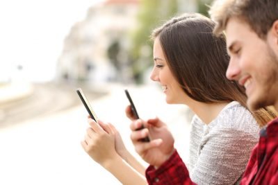 dating app business plan - couple using dating app